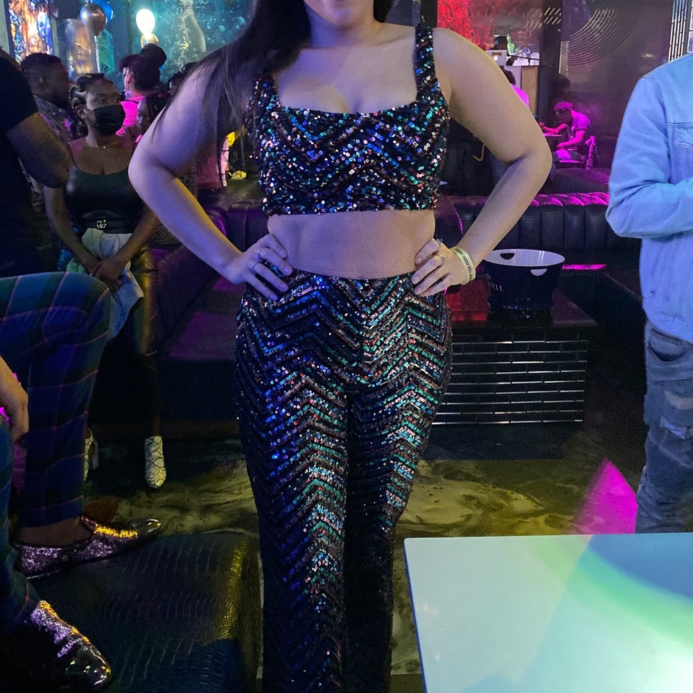 Multi color two piece pant set. Size US 8